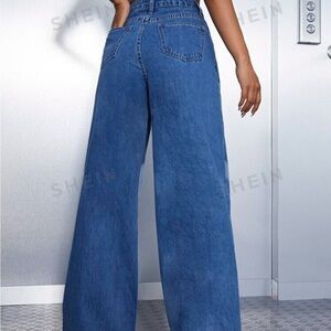 XS medium wash high waisted baggy jeans
